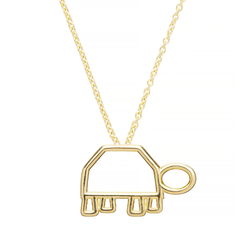 Gold chain necklace with a turtle shaped pendant