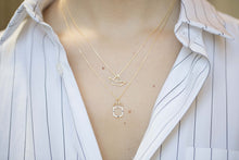 Load image into Gallery viewer, Gold chain necklace with stracciatella ice pop pendant worn by model
