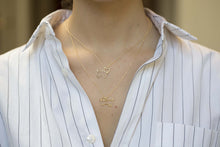 Carica l&#39;immagine nel visualizzatore di Gallery, Gold chain necklace with dog shaped pendant and small diamond worn by model
