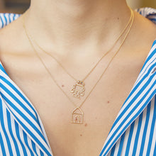 Load image into Gallery viewer, Gold chain necklaces with house and robot shaped pendants worn by model
