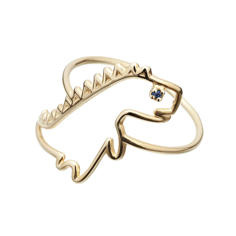 Dinosaur shaped gold ring with small blue sapphire