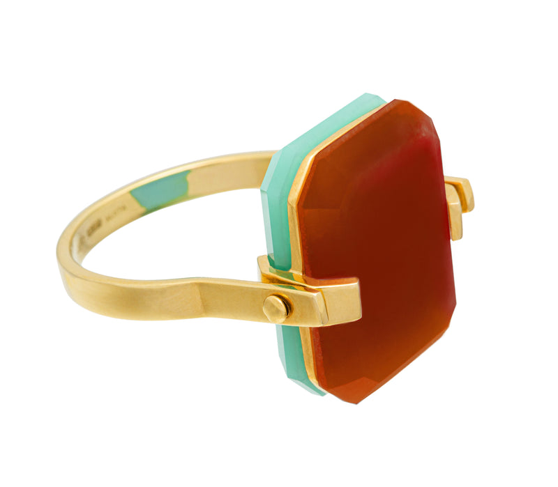 Gold turning ring with carnelian and crisopas octagonal shaped stones
