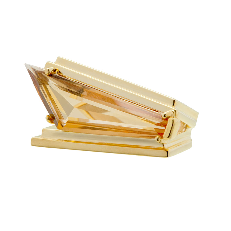 Gold ring with triangular cut citrine stone, front view