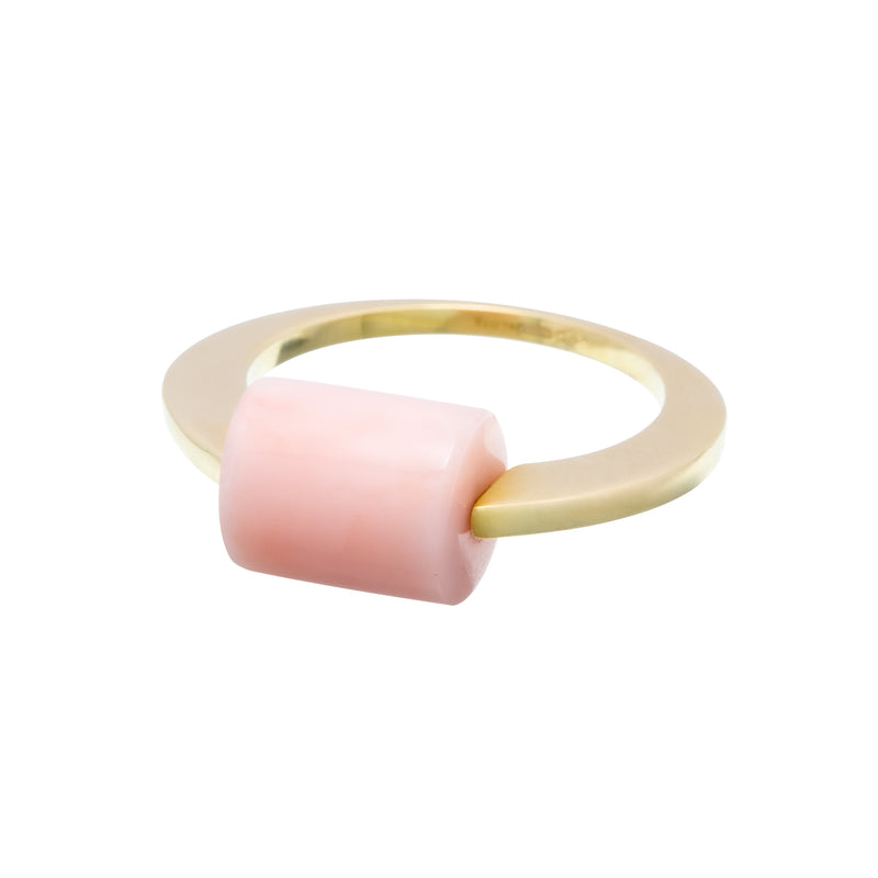 Gold ring with cylinder cut pink opal stone