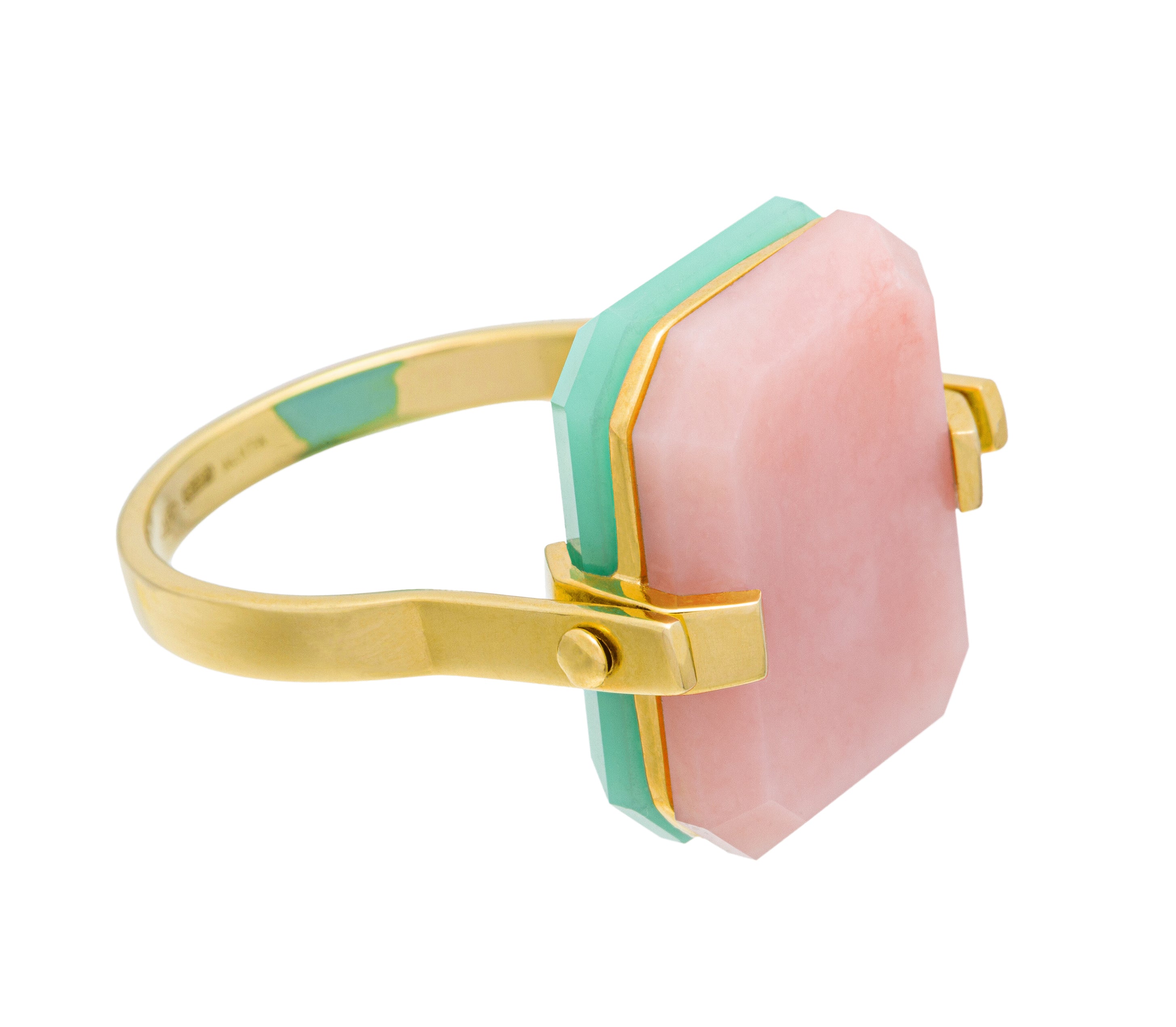 Gold turning ring with pink opal and crisopas octagonal shaped stones