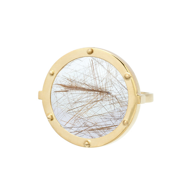 Gold ring resembling a ship porthole with a round rutile quartz