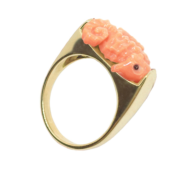 Gold ring with seahorse shaped pink coral