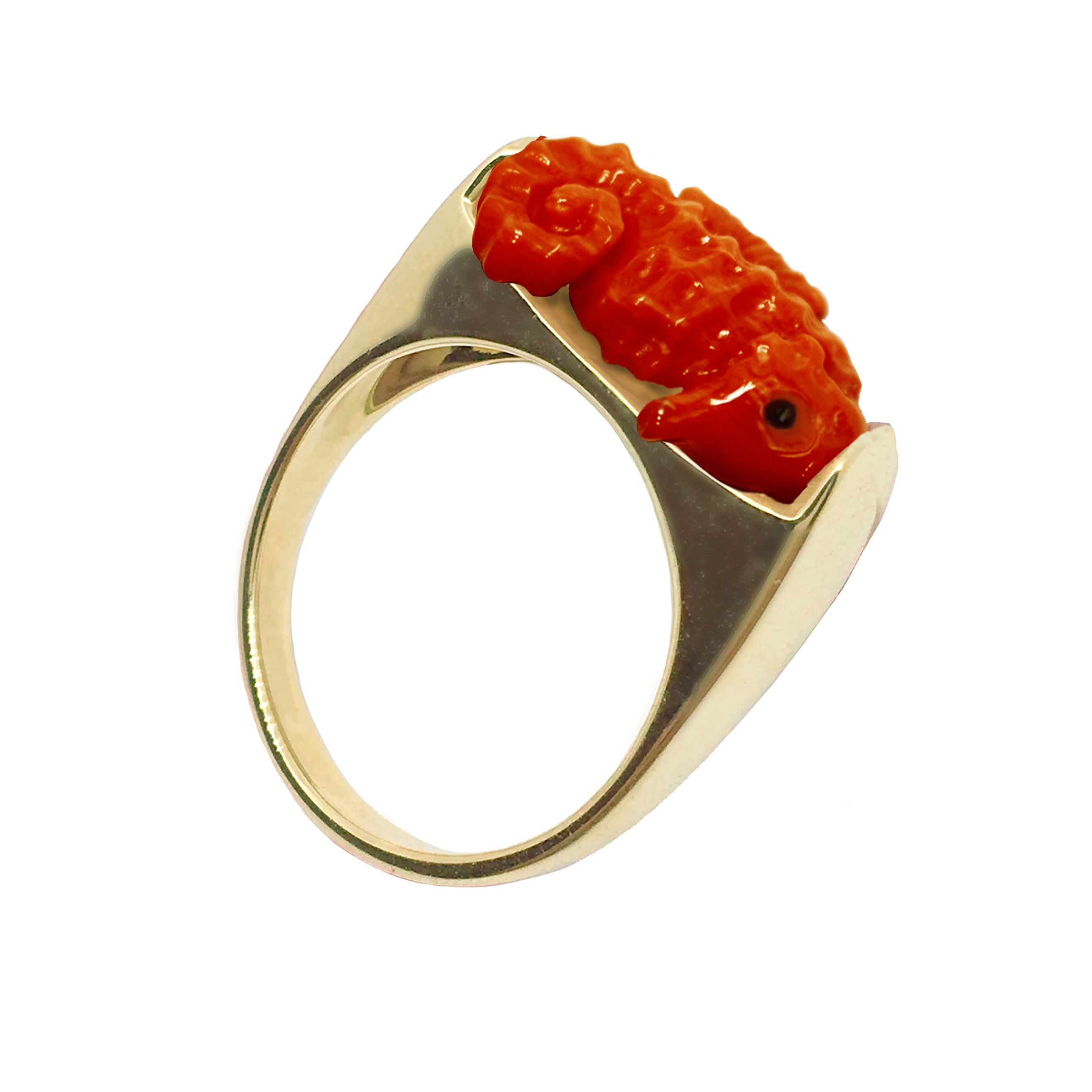 Gold ring with seahorse shaped red coral