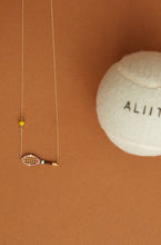 Carica l&#39;immagine nel visualizzatore di Gallery, Gold chain necklace with gold tennis racquet and ball shaped pendants in pink and yellow enamel detail
