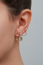 Load image into Gallery viewer, Seated cat shaped earring and heart shaped earring worn by woman
