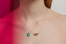 Load image into Gallery viewer, Woman wearing a gold chain necklace with a watermelon slice in red coral and a necklaces with avocado in green turquoise
